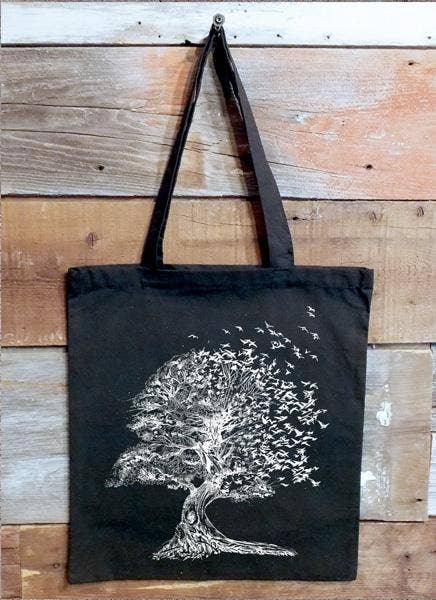 Tree Dissolving Into Birds Tote Bag: Natural